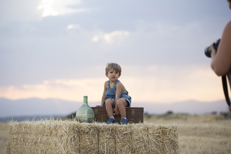 Child in the wheat fieldの写真素材