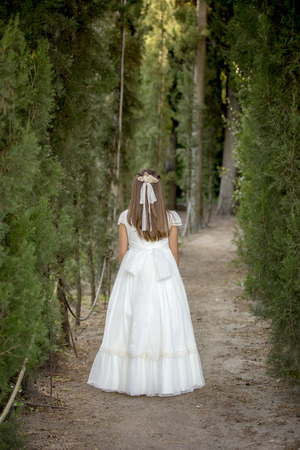 Girls of communion in a park in Madrid, Spainの写真素材