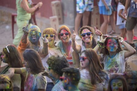 Holi run, in Galapagos, Guadalajara, Spain, on August 26, 2018, men women and children have fun in a popular race.のeditorial素材