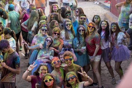 Holi run, in Galapagos, Guadalajara, Spain, on August 26, 2018, men women and children have fun in a popular race.のeditorial素材