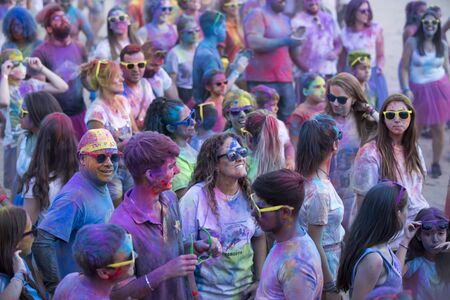 Holi run, in Galapagos, Guadalajara, Spain, on August 26, 2018, men women and children have fun in a popular race.のeditorial素材