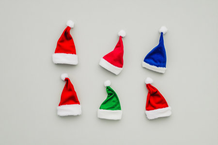 Santa Claus hats on white background. Christmas and New Year concept.の素材