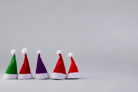 Christmas hat on white background with copy space for text. christmas backgroundの素材