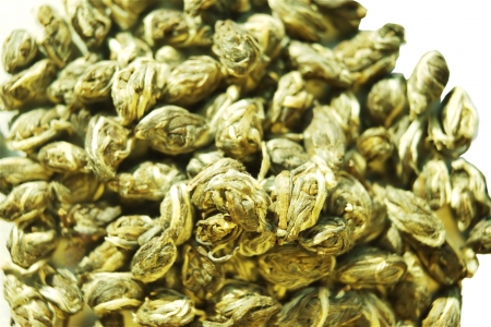 fresh tea leaves in details isolated studio shotの写真素材