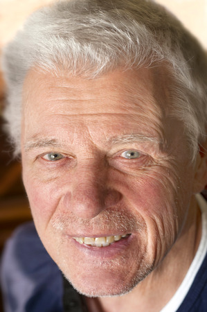 Portrait of a happy senior, indoor shot with selective focusの写真素材