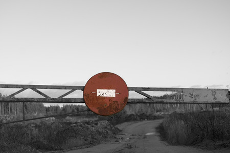 Empty road with Road Closed sign, selective color shotの写真素材