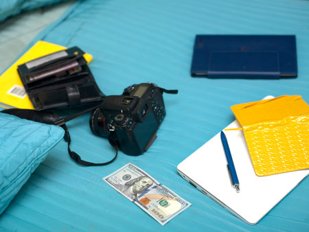 Personal effects laid on the bed, concept of travel
