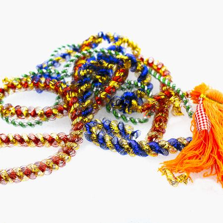 Colorful frippery placed on white background, studio closeupの写真素材