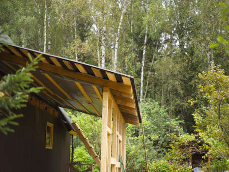 construction of a wooden addition to a house, outdoor shot