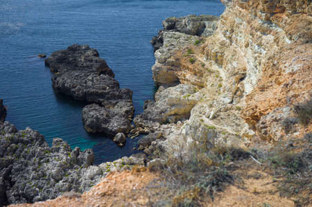 cliffes and steep descent to the sea, summertime shot