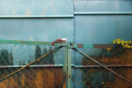 Old metal garage or barn locked, outdoor shot