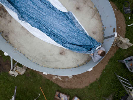 A bird fligh view of an above ground pool constructionの写真素材