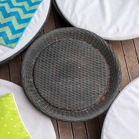Group of armchairs around a wicker table, above view