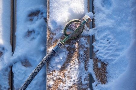 Frozen LPG hose placed on the snow, winter sceneの写真素材