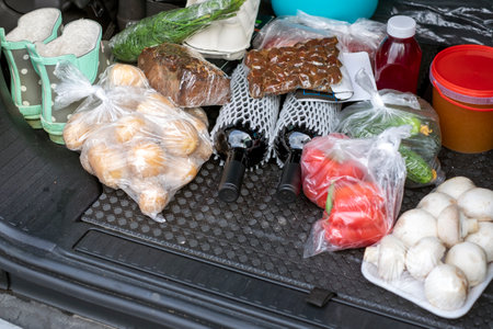 a car boot loaded with purchased food, outdoor close upの写真素材