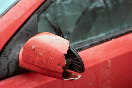 close up outdoor shot of a smashed car mirrorの写真素材