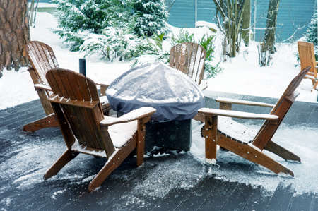patio with fireplace and garden furniture, outdoor winter sceneryの写真素材