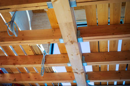 blue sky through unfinished timber ceiling, indoor shot