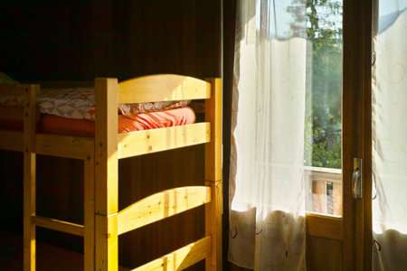 bunk bed and open door for a room ventilation, indoor shotの写真素材