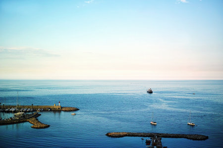 a bay and departing passenger ship, high resolution outdoor shotの写真素材