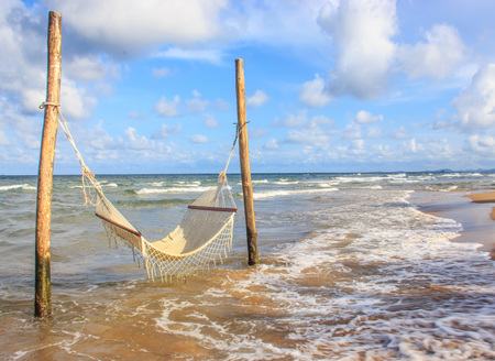 Tropical chilling moment - Hammock on the beach.の写真素材