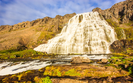 The magnificent summer view of Dynjandifoss (Dynjandi Waterfall), jewels of the Westfjords, Iceland. The biggest waterfall in Westfjords.の写真素材
