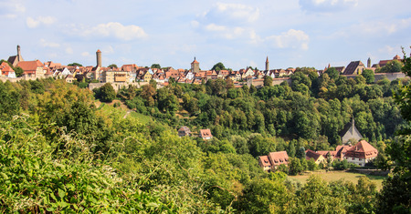 Rothenburg ob der Tauber Old town, wall and church hidden in the forest, Rothenburg ob der Tauber, Germany. One of the most famous attractions in Romantic Road Driving Destination.の写真素材