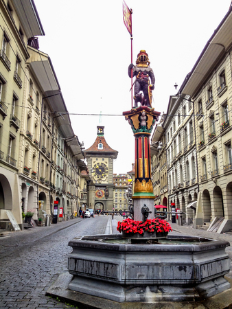 Beautiful City Street View of the colorful medieval Zahringen statue on top of elaborate fountain in Bern, Switzerland. The fountain is attributed to Hans Gieng in 16th century.のeditorial素材
