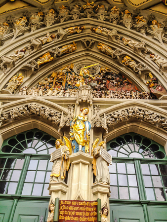 the remarkable sculpture, the Last Judgment, carved over the main entrance of St. Vincent Cathedral (Munster Kirche) at Munsterplatz, Berne, Switzerlandの写真素材