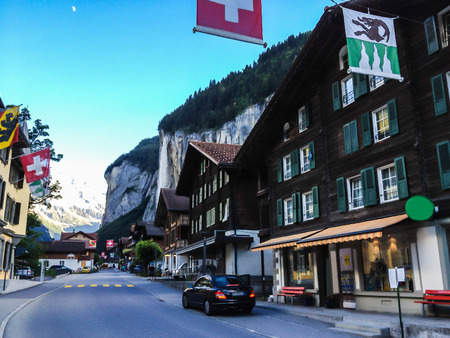 Charming Lauterbrunnen Village View at sunset with Staubbachfall and Lauterbrunnen Valley as a background.のeditorial素材