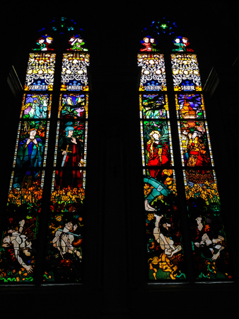 Fribourg, Switzerland - June 26, 2012: Stained Glass Windows created by the Polish painter, Jozef Mehoffer, between 1896 and 1936, is located in St. Nicolas cathedral, Fribourg, Switzerlandの写真素材