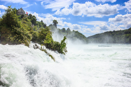 Beautiful summer day view of Rheinfall waterfalls at Rhine River, the biggest waterfalls of Europe, in Schaffhausen, Switzerland.のeditorial素材