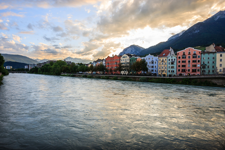 Charming Innsbruck architectural houses on Inn River and European alps natural background, Tyrol, Austria, Europeの写真素材
