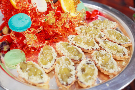 green jelly puff pie pastry appetizer Assortment with candy art decor. Hotel restaurant food...