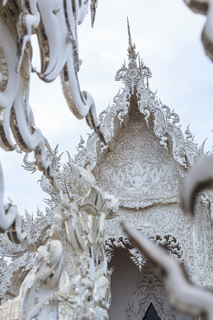 Chiangrai, Thailand - September 01, 2018: Wat Rong Khun (White Temple) is one of most favorite landmarks tourists visit in Thailand, built with modern contemporary unconventional Thai Buddhist arts.のeditorial素材