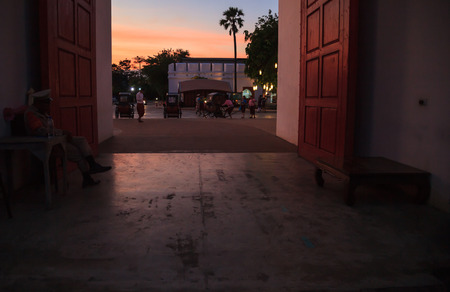 Traditional ancient Asian old town city gate entrance with beautiful twilight sky. Thailand Tourist...
