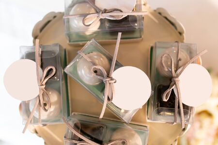 Salt and Pepper Shakers as wedding gifts or souvenirs with plastic box packages that bride and groom prepared for relatives and guests as thanks for their attendance. Gift and Packaging Idea Conceptの写真素材