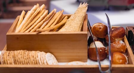 Farmhouse Freshly Baked Italian Styled Breadsticks (Grissini Bread), pencil-sized sticks of crisp, dry baked bread. Food Staple from natural organic ingredient, healthy meal. Daily Nutrition Concept.の写真素材