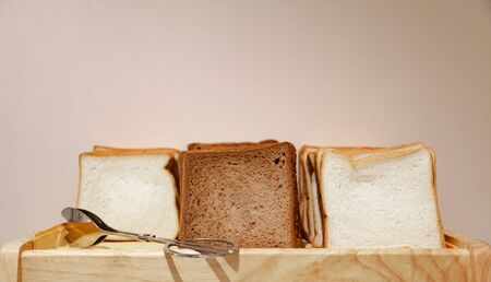 Selective Focused White and Brown Healthy Organic Farmhouse Sandwich Bread Lines, ready to eat or...