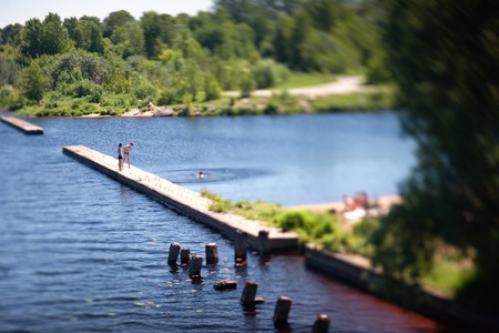 Young people bathe in the river in summerの写真素材