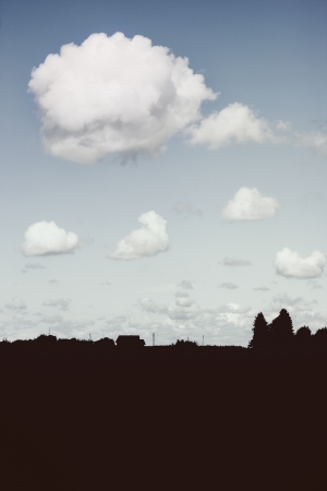 Rural landscape with a cloud on a summer dayの写真素材