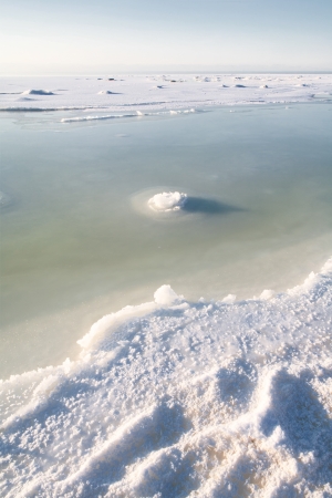 Sea water is frozen in winterの写真素材