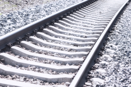 Railroad tracks and a mound of stonesの写真素材