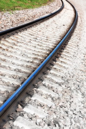Railroad tracks and a mound of stonesの写真素材
