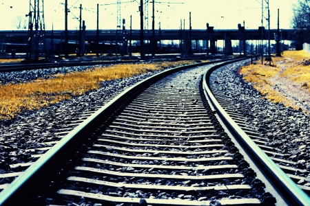 Railroad tracks and a mound of stonesの写真素材