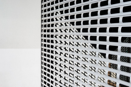 Rhythmic grid on the entry into the houseの写真素材