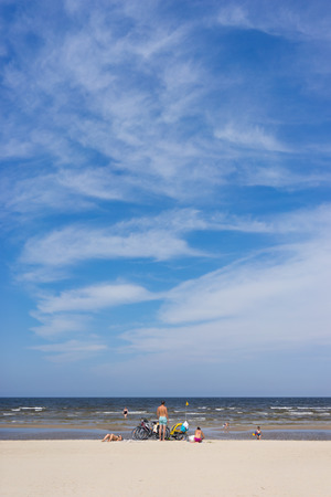 Family resting on the beach in Jurmala. Latviaの写真素材