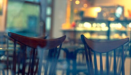 Beautiful vintage chairs in an empty cafe in the center of old Rigaの写真素材
