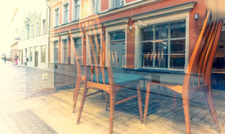 Beautiful vintage chairs in an empty cafe in the center of old Rigaの写真素材