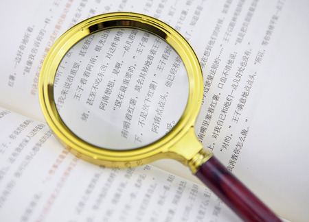 Magnifying glass and bookのeditorial素材